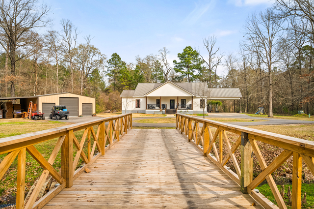 Woodworth LA creekfront estate main home exterior